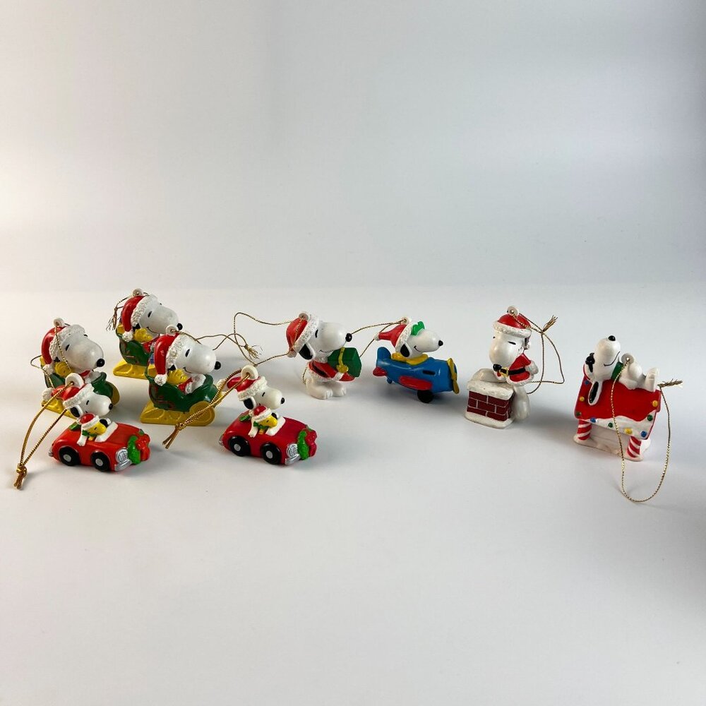 Lot of 9 Vintage Peanuts Snoopy Woodstock Christmas Ornaments Santa Car Airplane